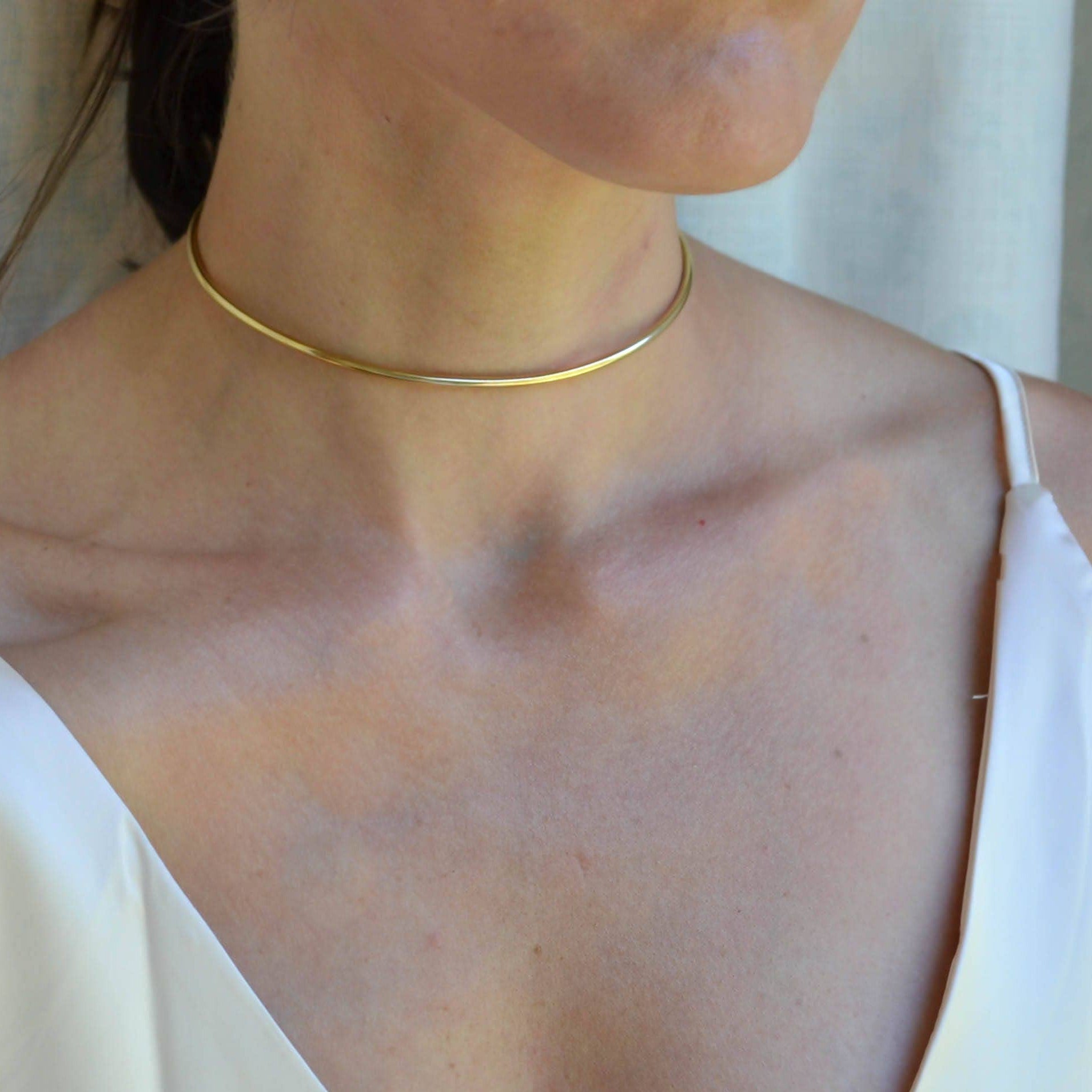 Metal necklaces & chokers, for stacking, layering or wearing alone. Your perfect base layer jewelry. Discreet day collars.