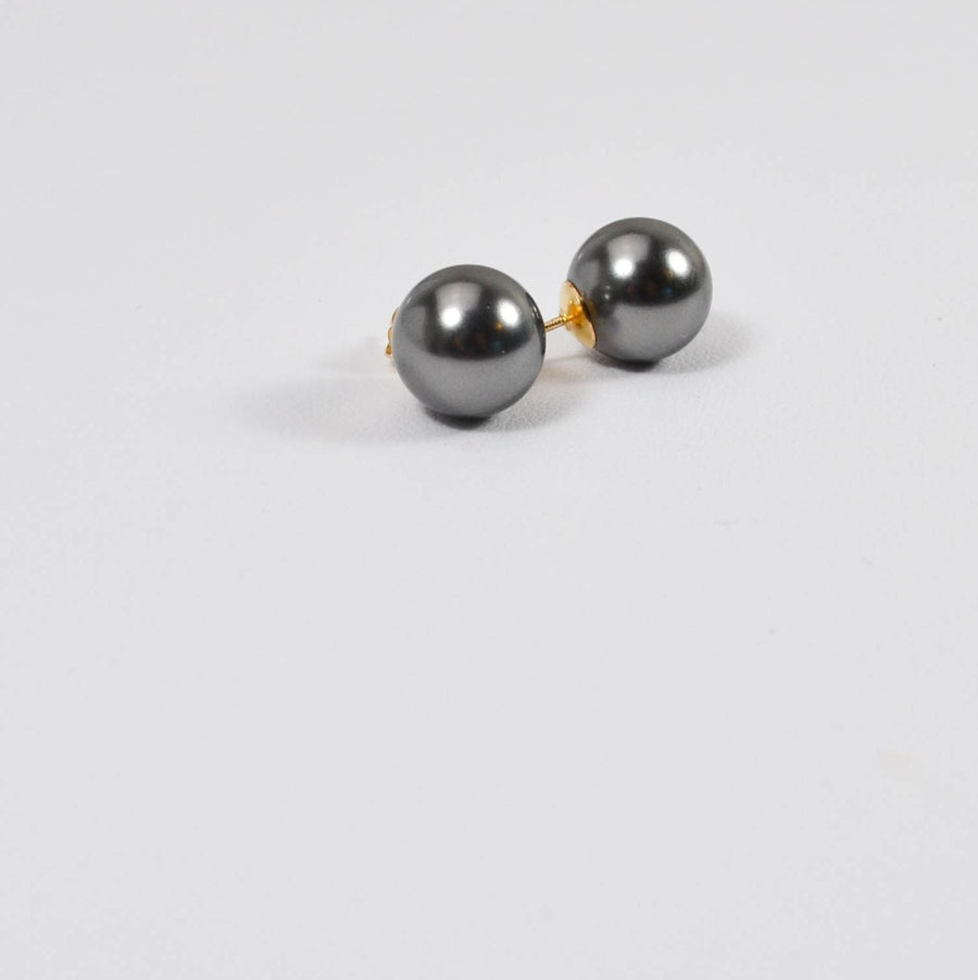 Black 10mm Swarovski pearl studs in 14K gold filled settings on a clean white background.