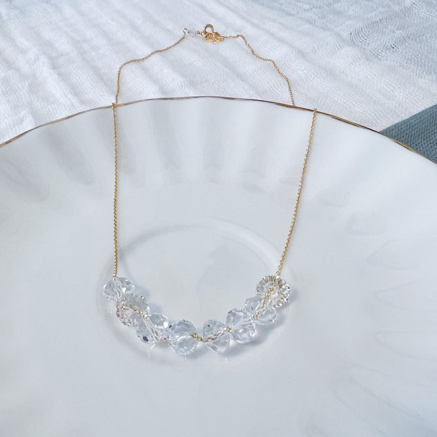 Sparkling Swarovski crystal bridal necklace for weddings and special occasions, a minimalist yet sophisticated statement piece.