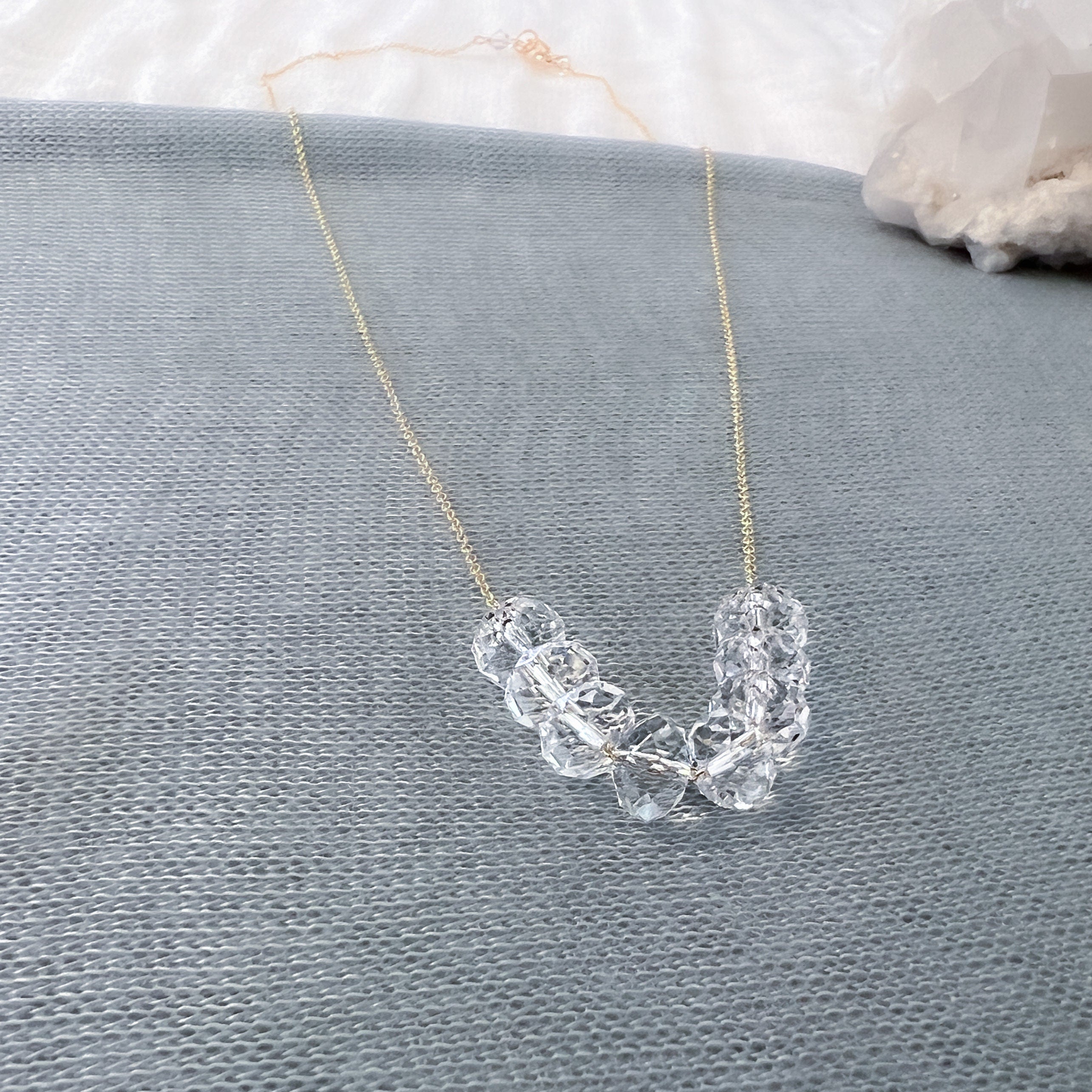 Carrie Bradshaw inspired Swarovski crystal necklace with a "Parisian glow" design, handcrafted bridal jewelry by Sela and Sage.