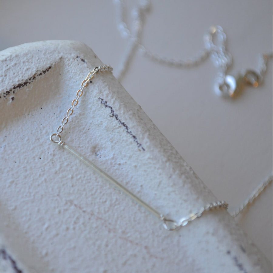 Polished .925 sterling silver bar charm, high-quality flat metal pendant with a reflective mirror finish.